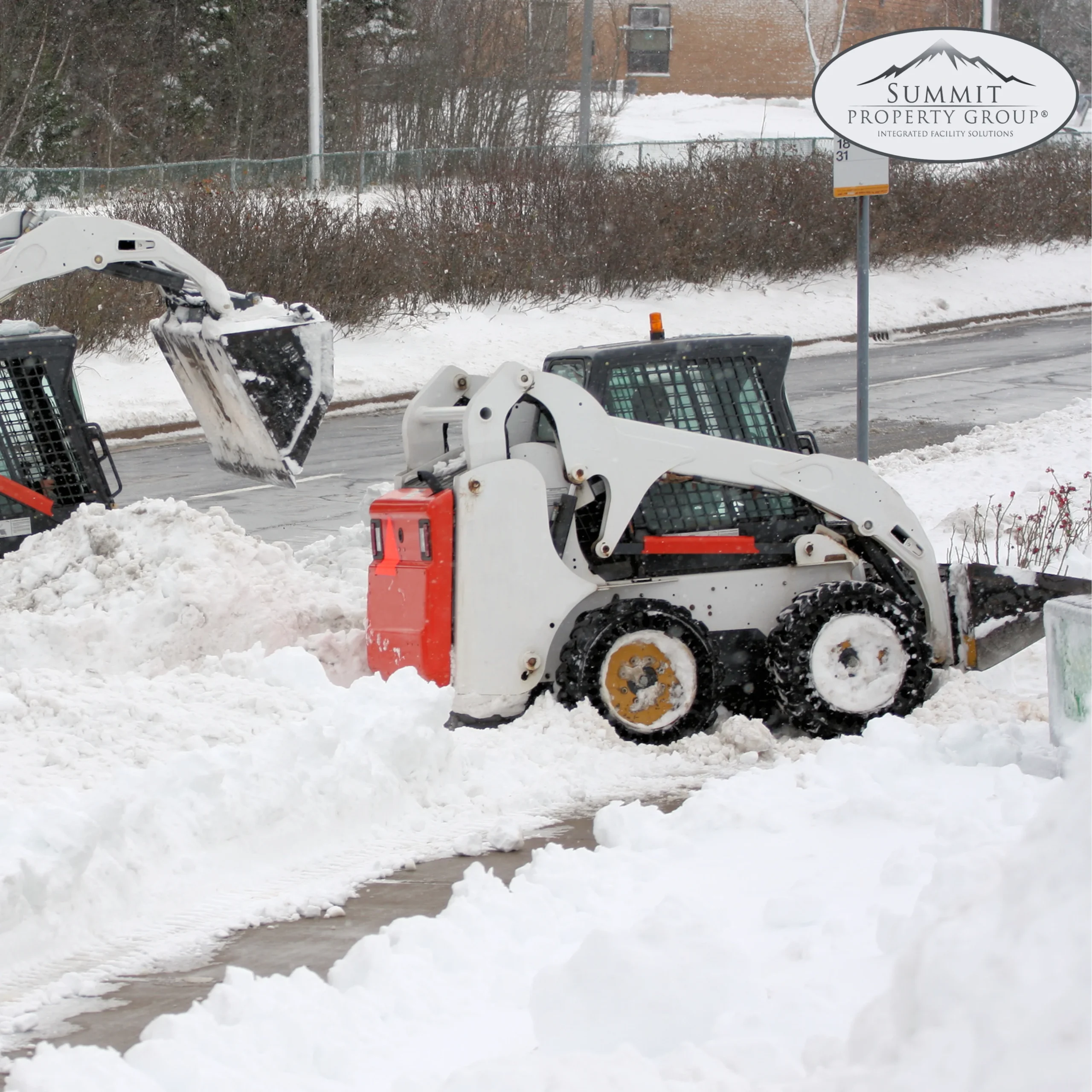 Two skid-steer loaders clearing snow from a residential sidewalk and street, emphasizing Summit Property Group's efficient snow removal services in Lethbridge.